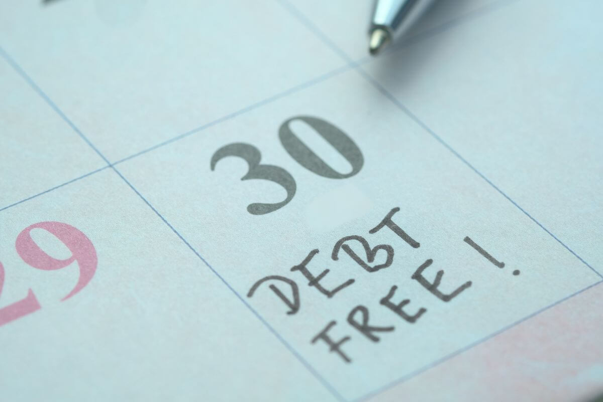 An image of a calendar with debt free note.