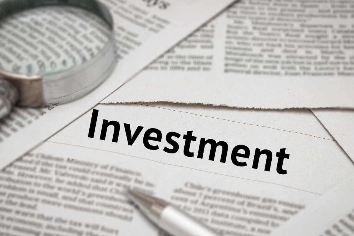 An image of an investment wording on a paper.