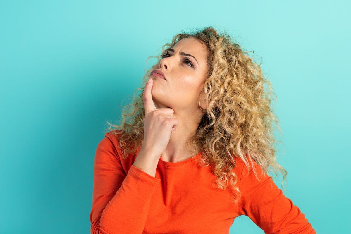 A picture of a woman thinking.