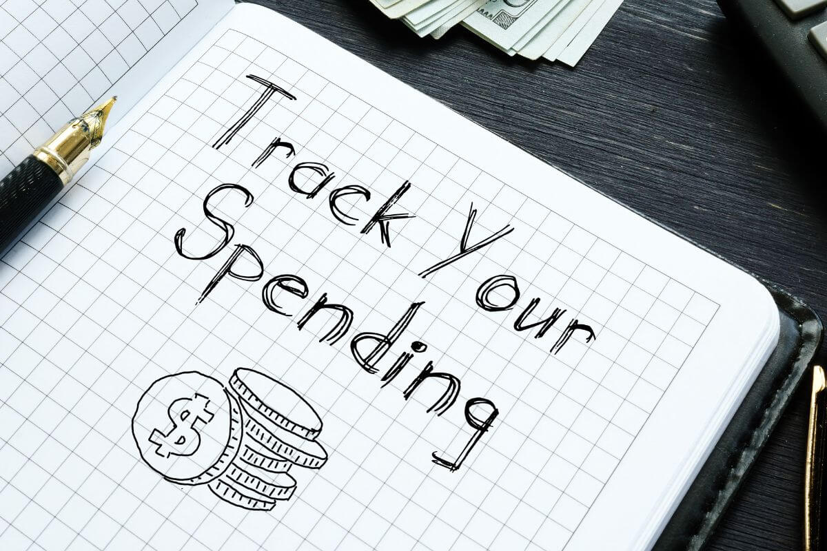 An image of a notebook with the Track Your Spending wording.
