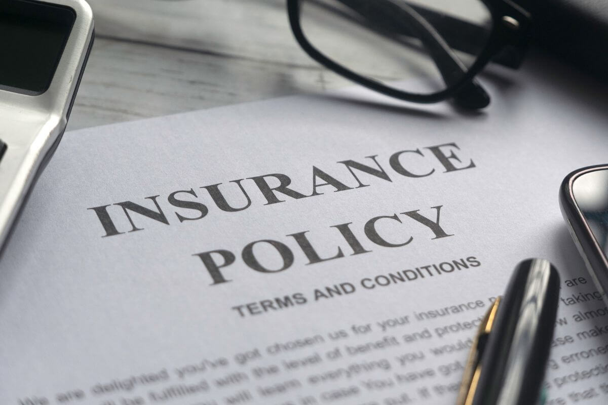 A picture shows an insurance policy document.