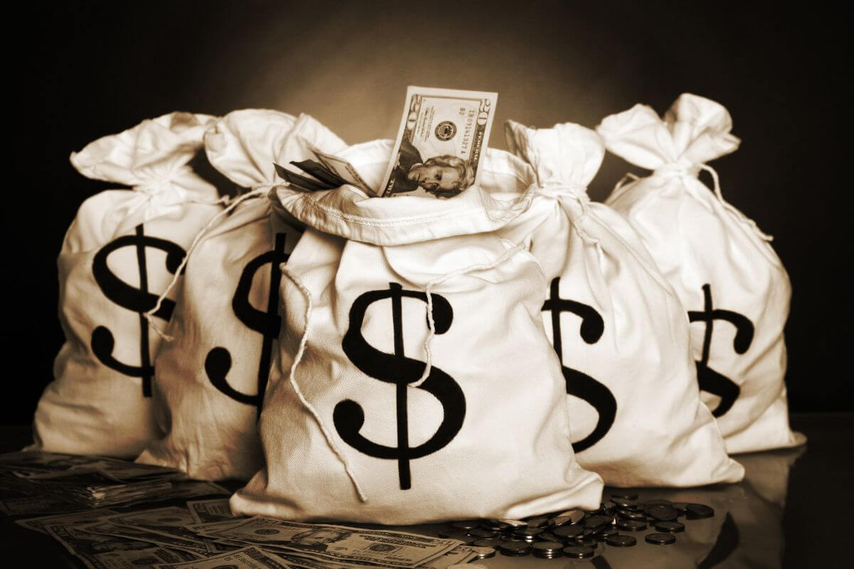An image shows bags of money.
