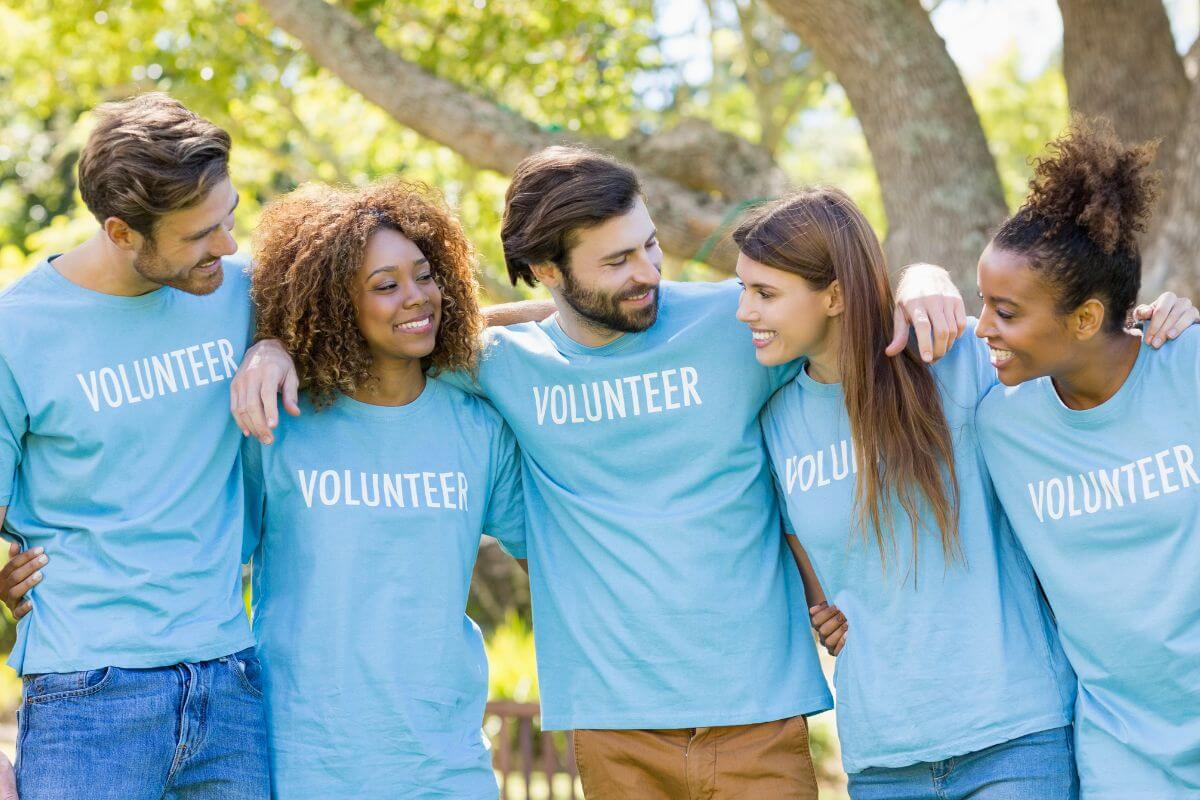 An image shows a group of volunteers.