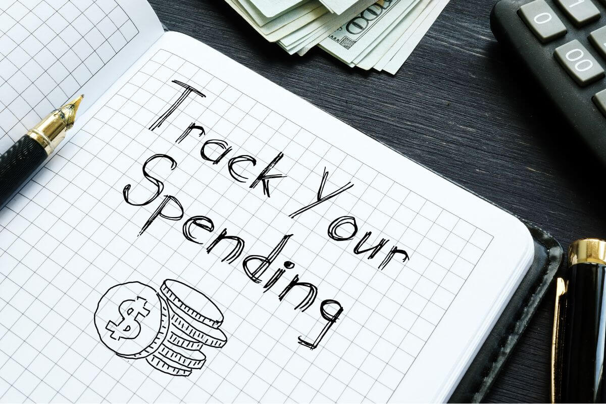 An image of a notebook with the Track Your Spending wording.
