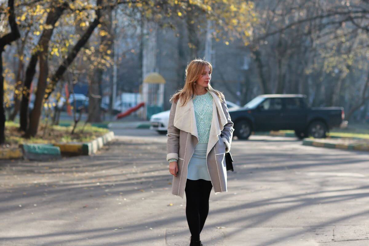 An image of a woman exploring the town.