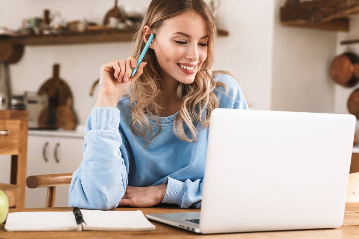 An image of a woman using a laptop.