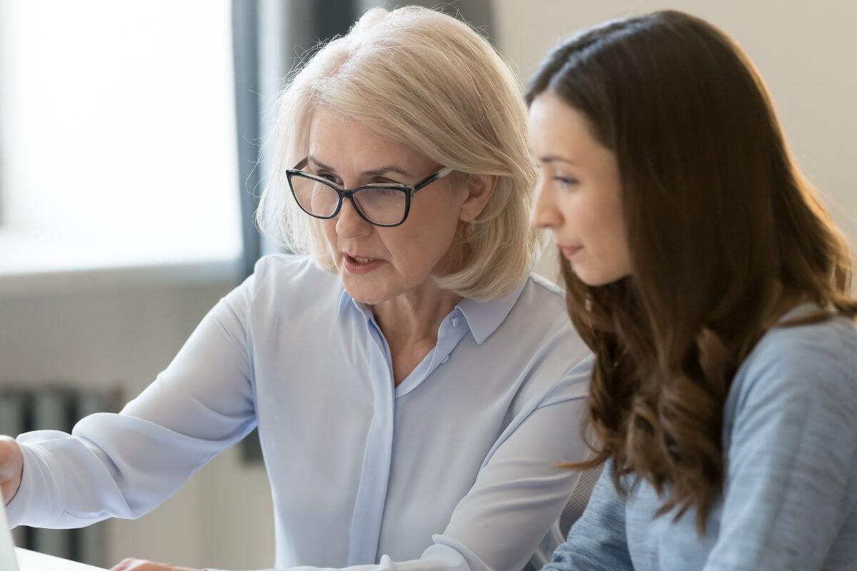 A picture of a woman and her mentor.