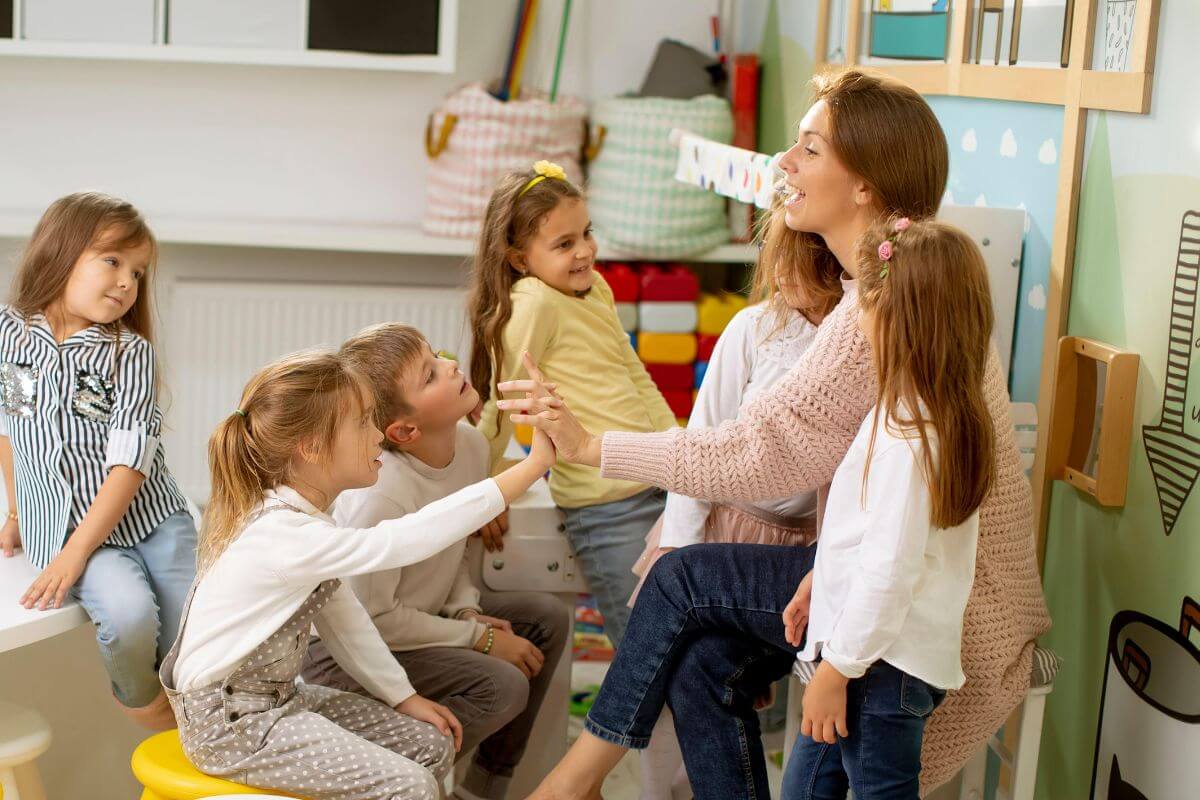 A picture shows a group of kids and their coach.