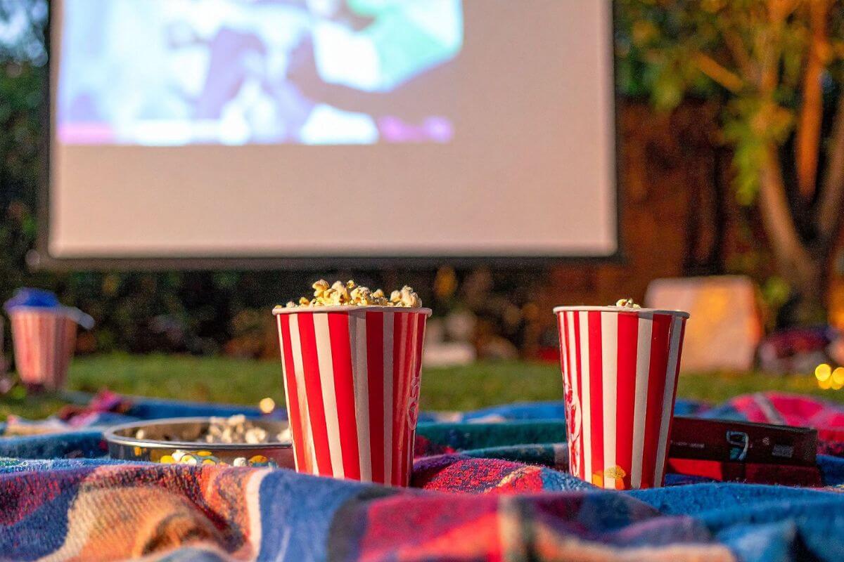 A picture shows popcorn and a movie screen.