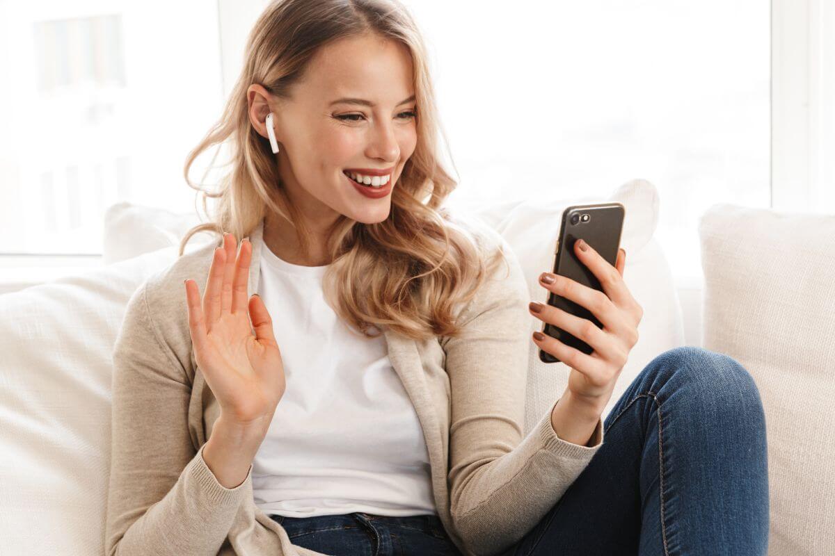 An image of a woman recording herself.