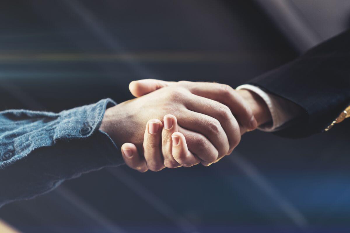 A picture of people shaking hands.