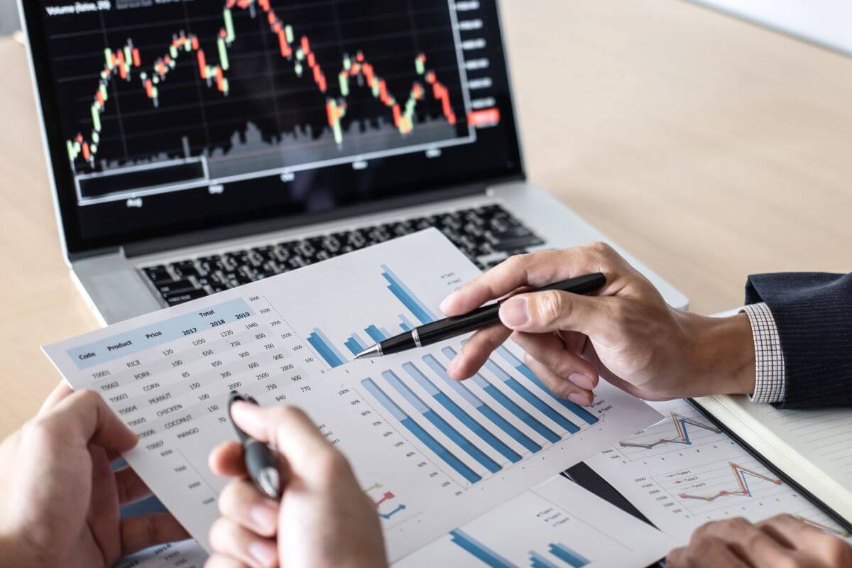 A picture of someone analyzing the market.