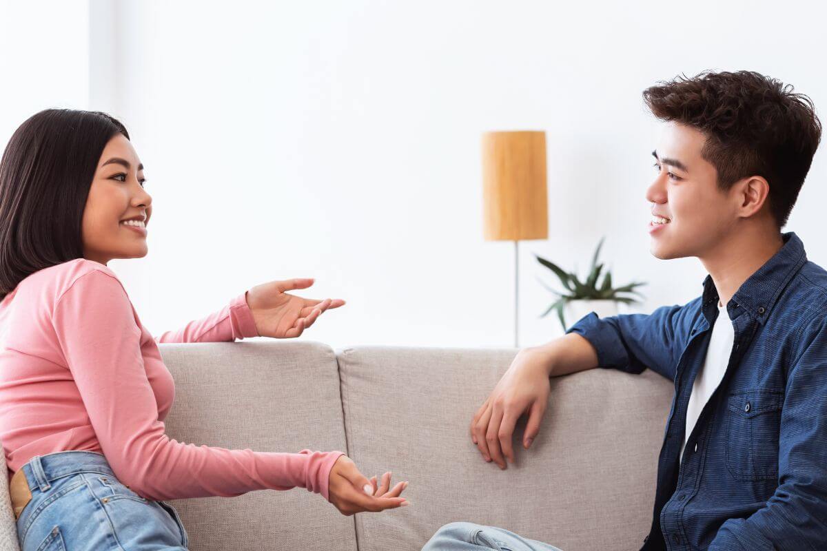 A photo of a couple talking.