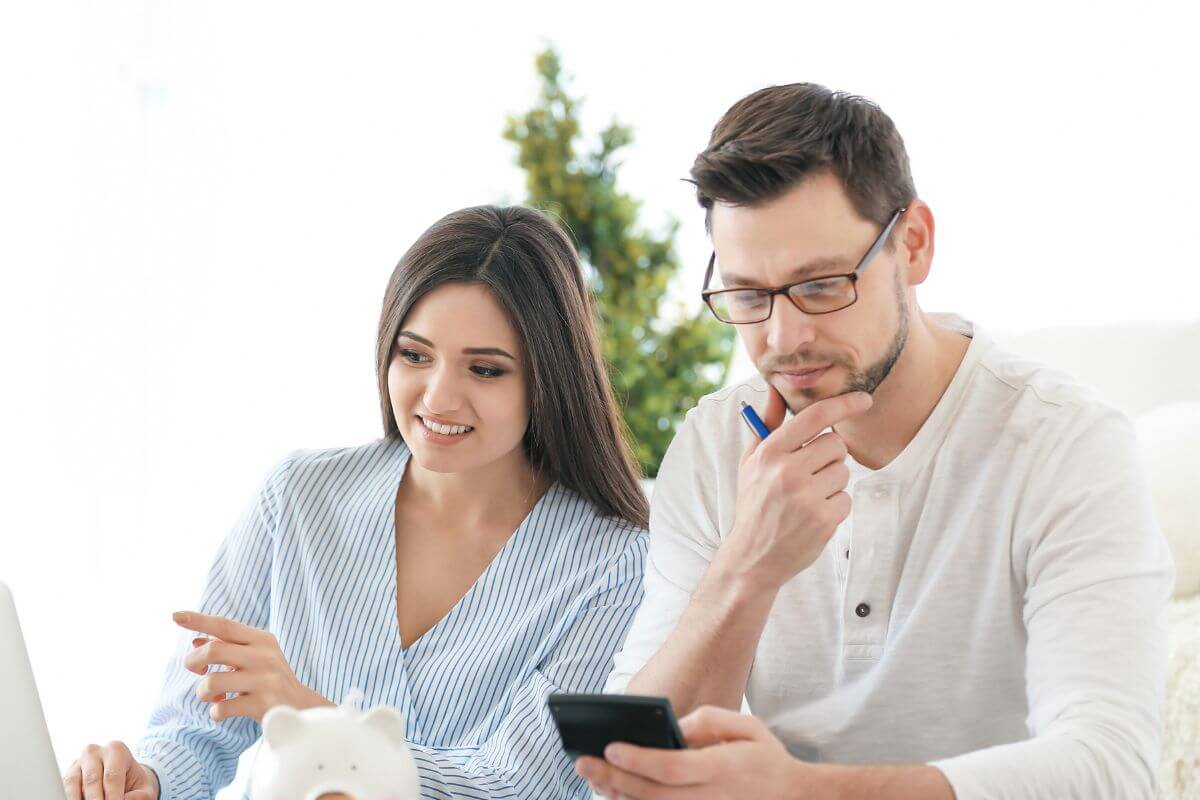 A photo of a couple planning something. 