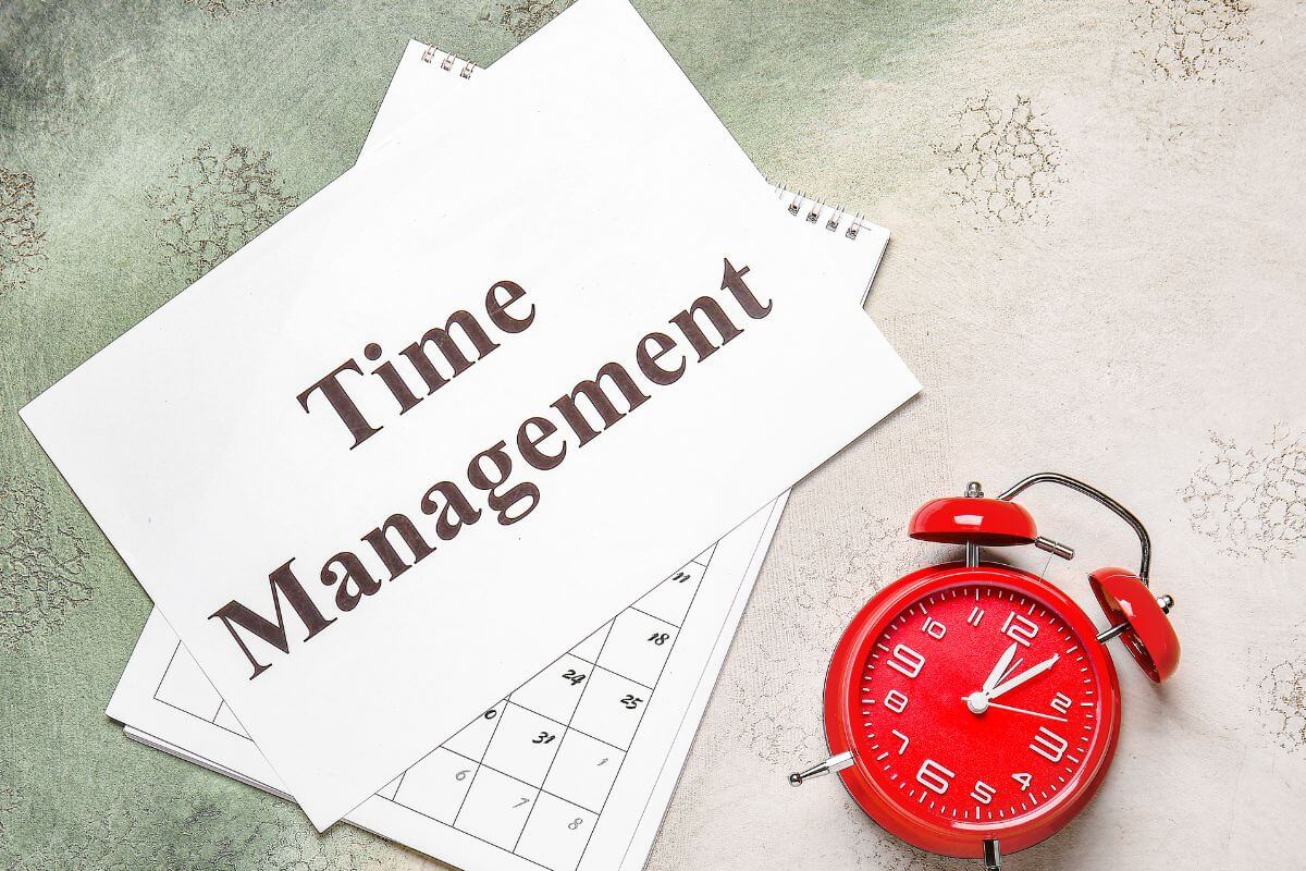 An image shows a paper with time management wording.