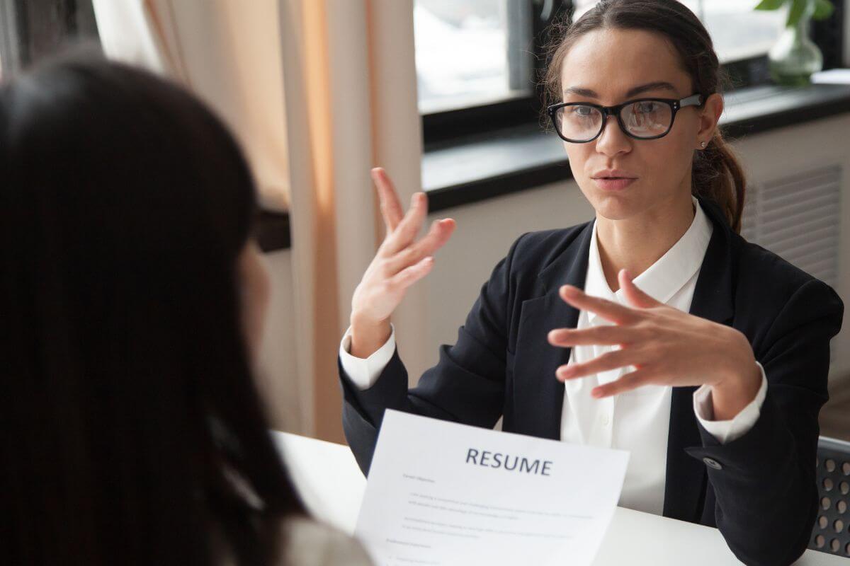 A picture shows a woman on a job interview.