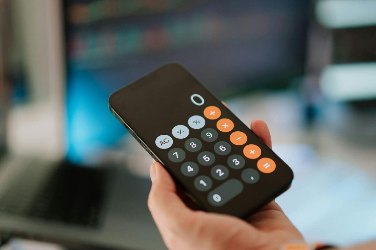 A picture of someone using their calculator.
