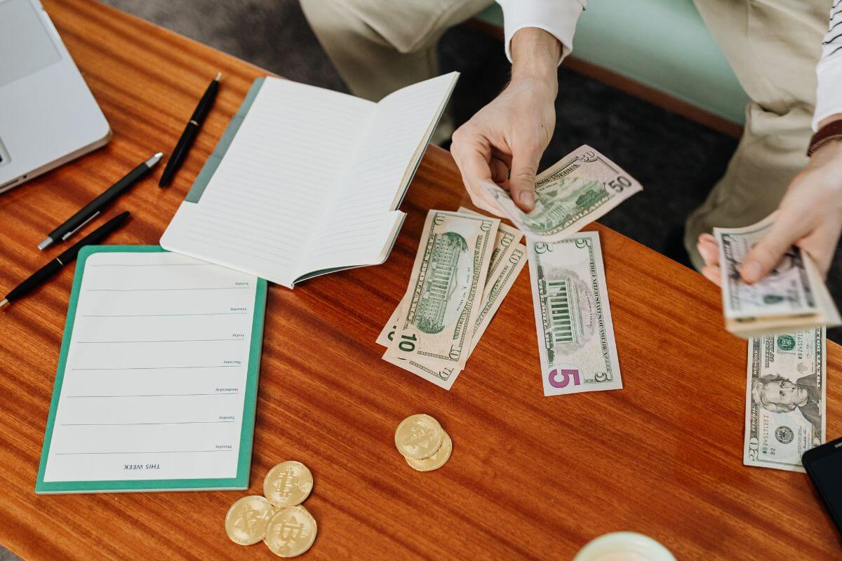 A picture of someone budgeting money.