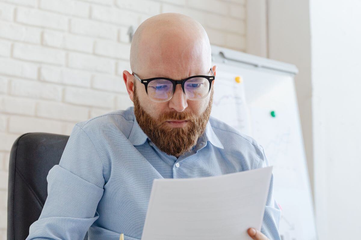 A picture of someone reviewing their papers.