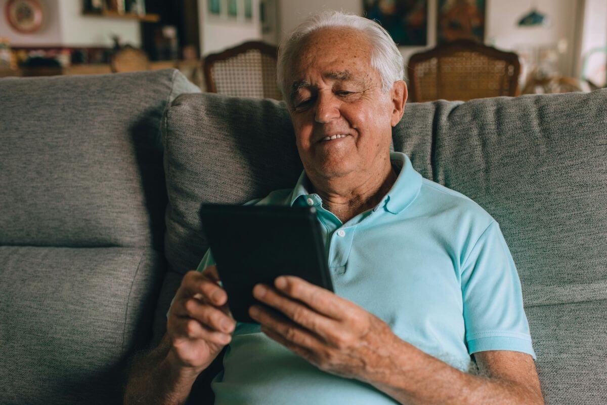 A picture of an elderly man smiling.