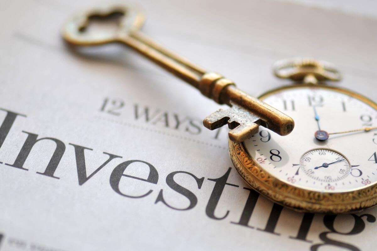 A picture of a key and a pocket watch.