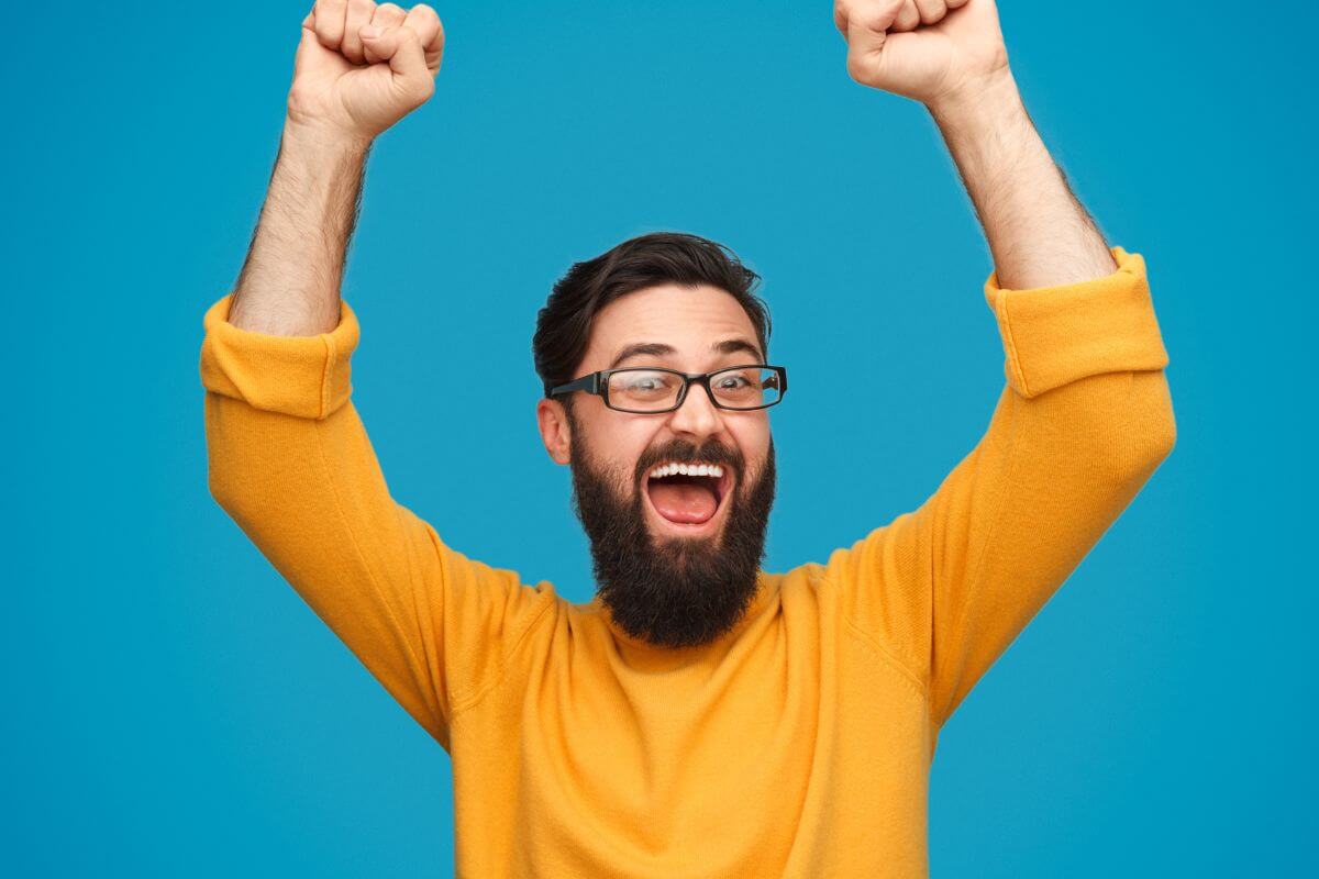 A picture of a man celebrating.