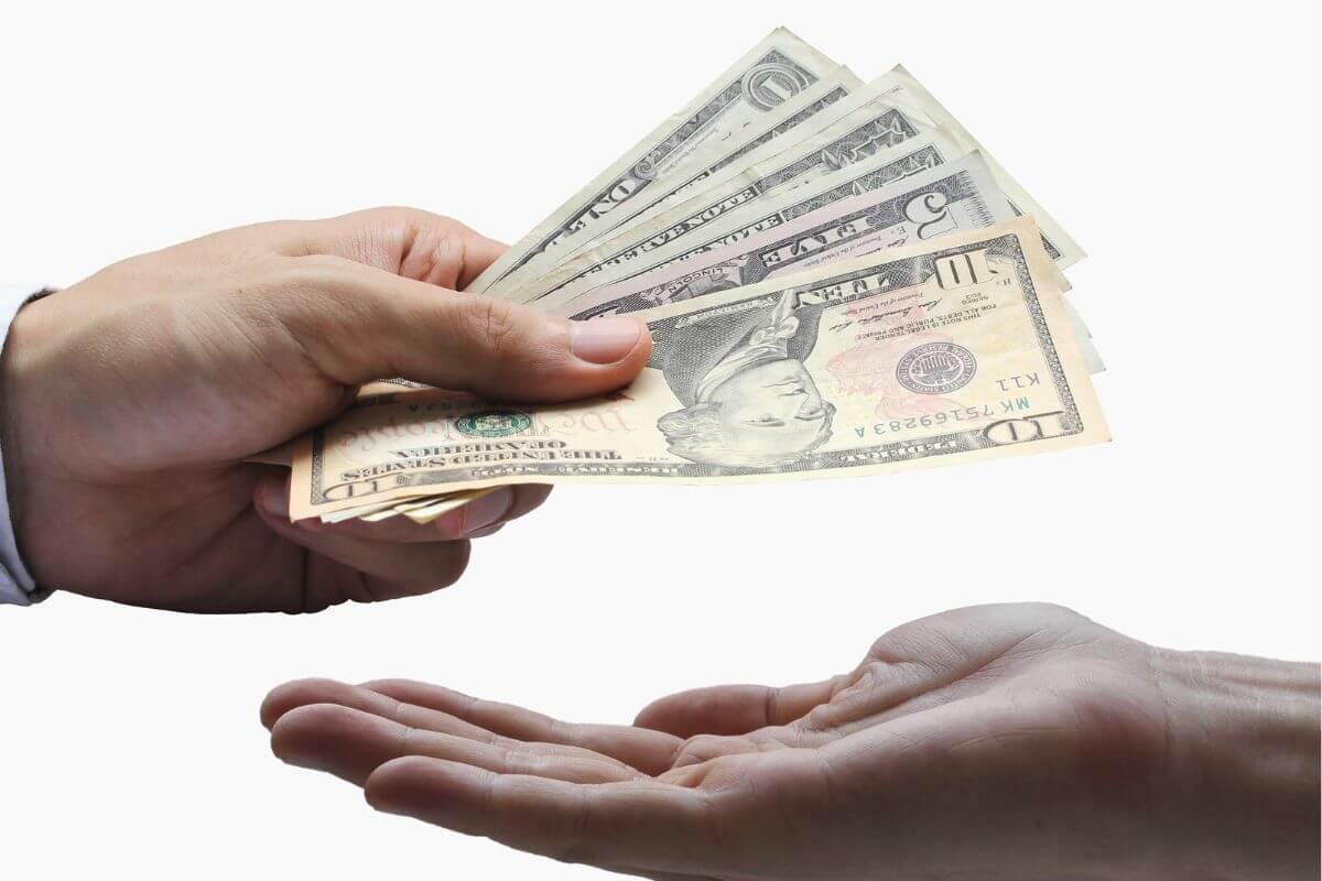 A picture of someone paying himself.