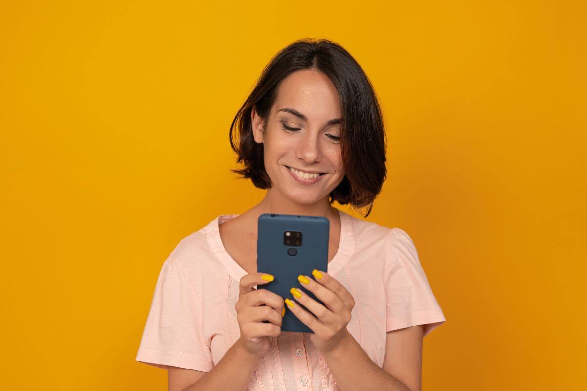 A picture of someone looking at their phone.