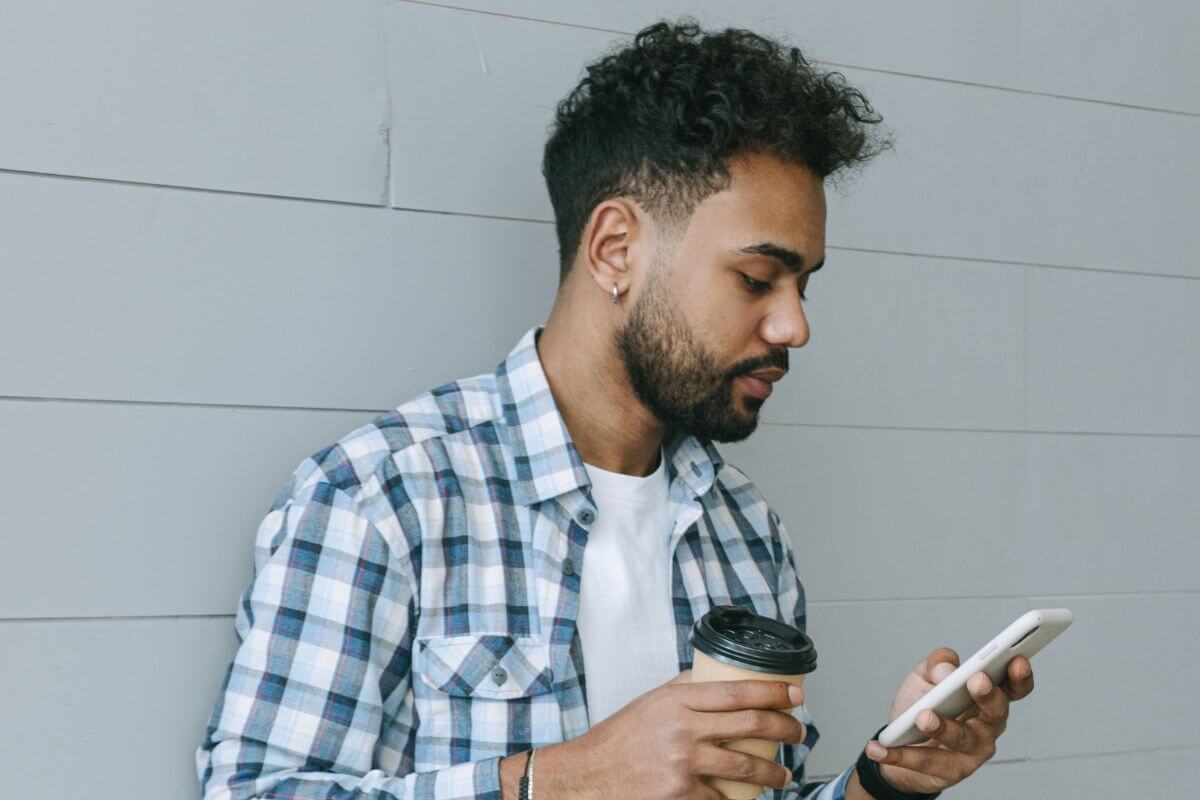 A picture of someone looking at their phone.