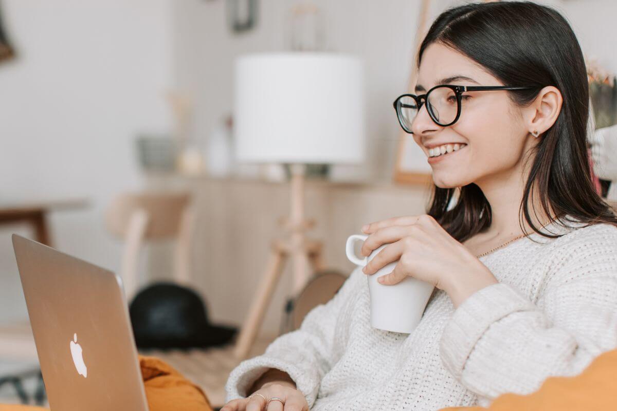 A picture of someone with a laptop.