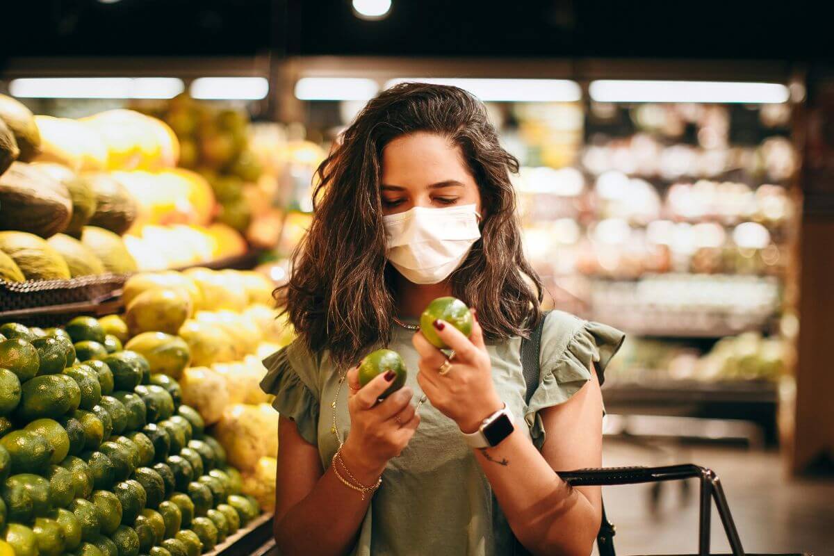 A picture of someone comparing prices.