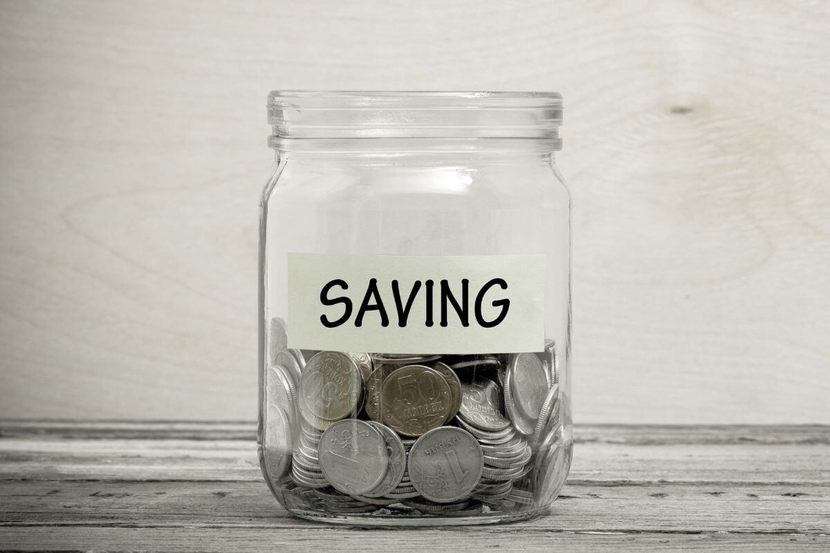 A picture shows a jar with saved money.