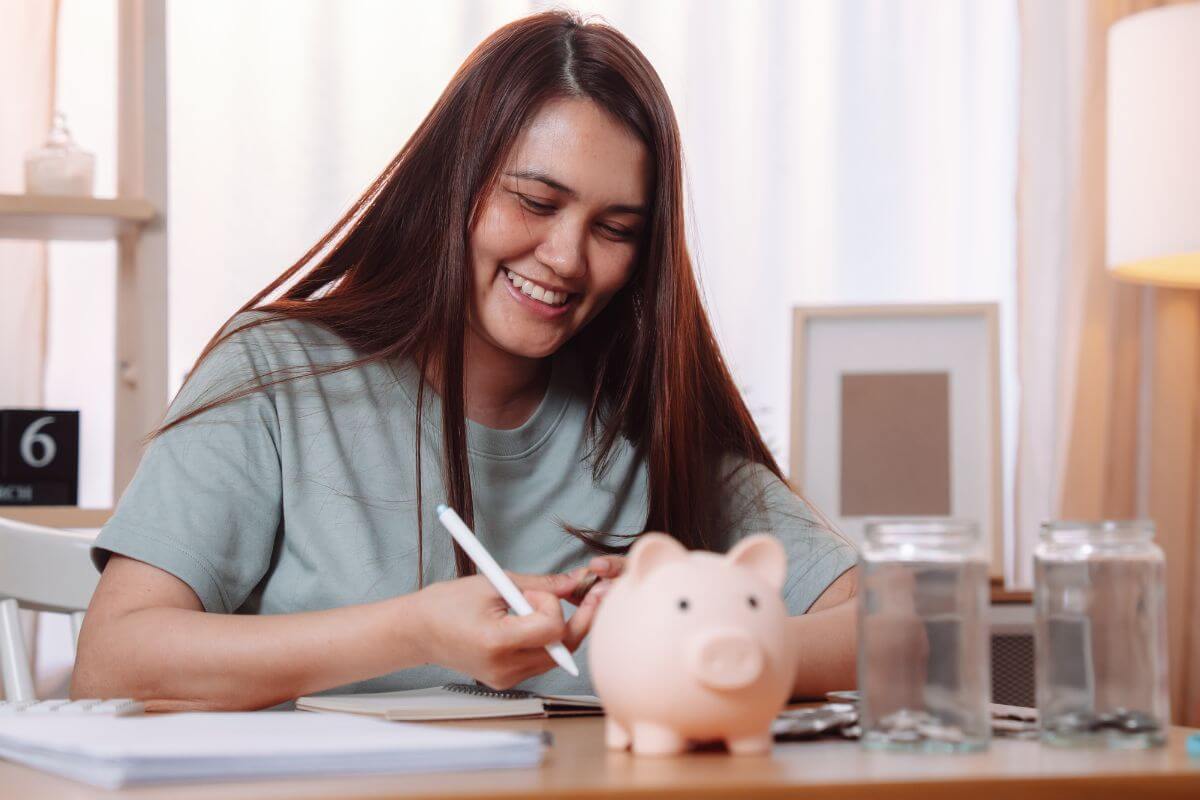A picture of a woman planning her savings.