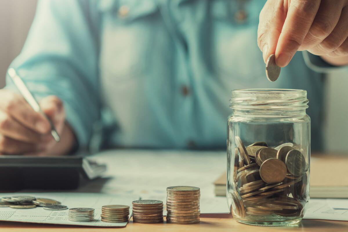 A picture of a woman saving money.