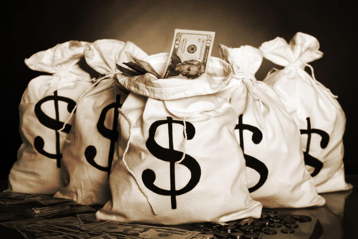 A picture shows bags of money.