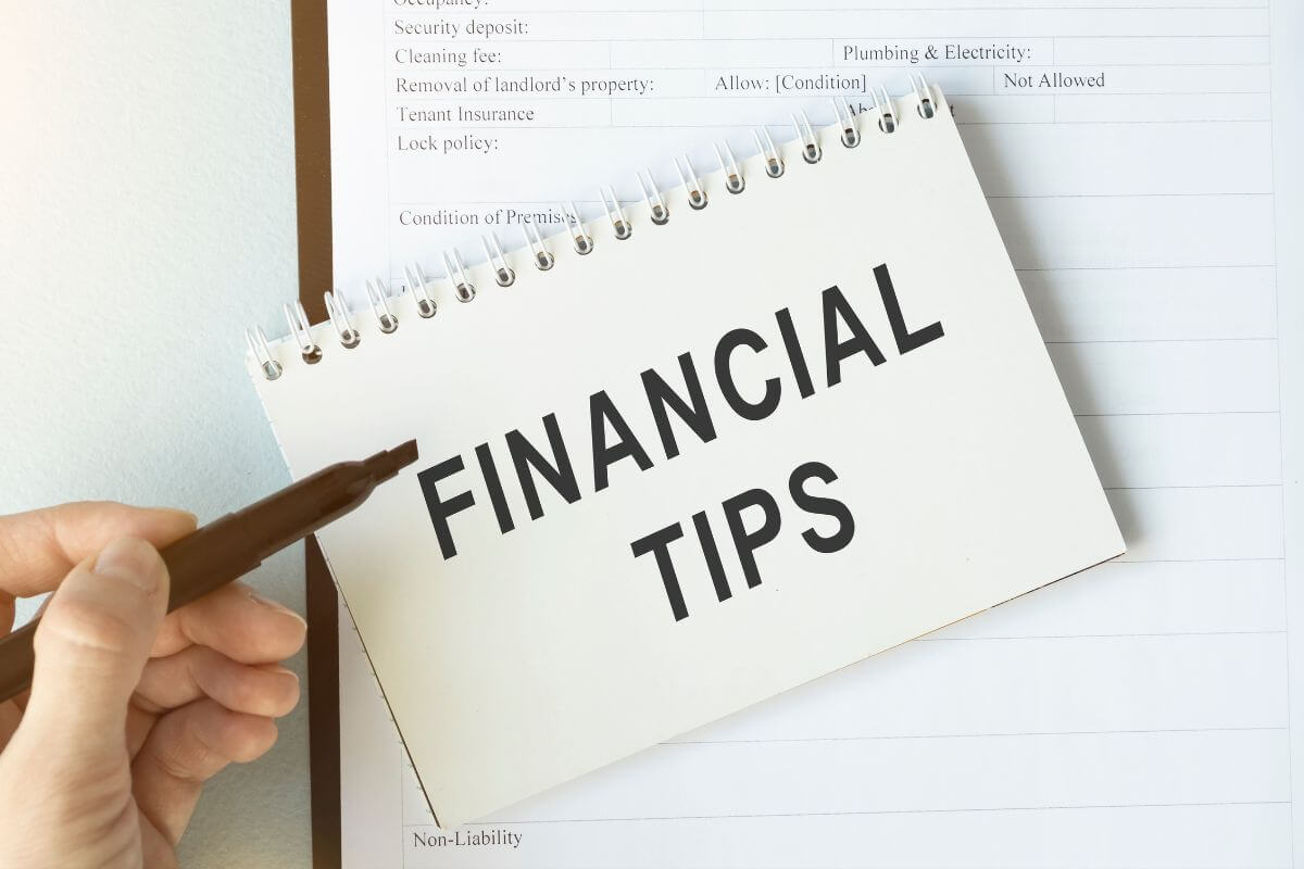 An image of a notebook with financial tips wording.