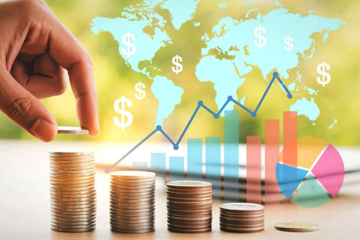 A picture shows stacks of coins and graphs.