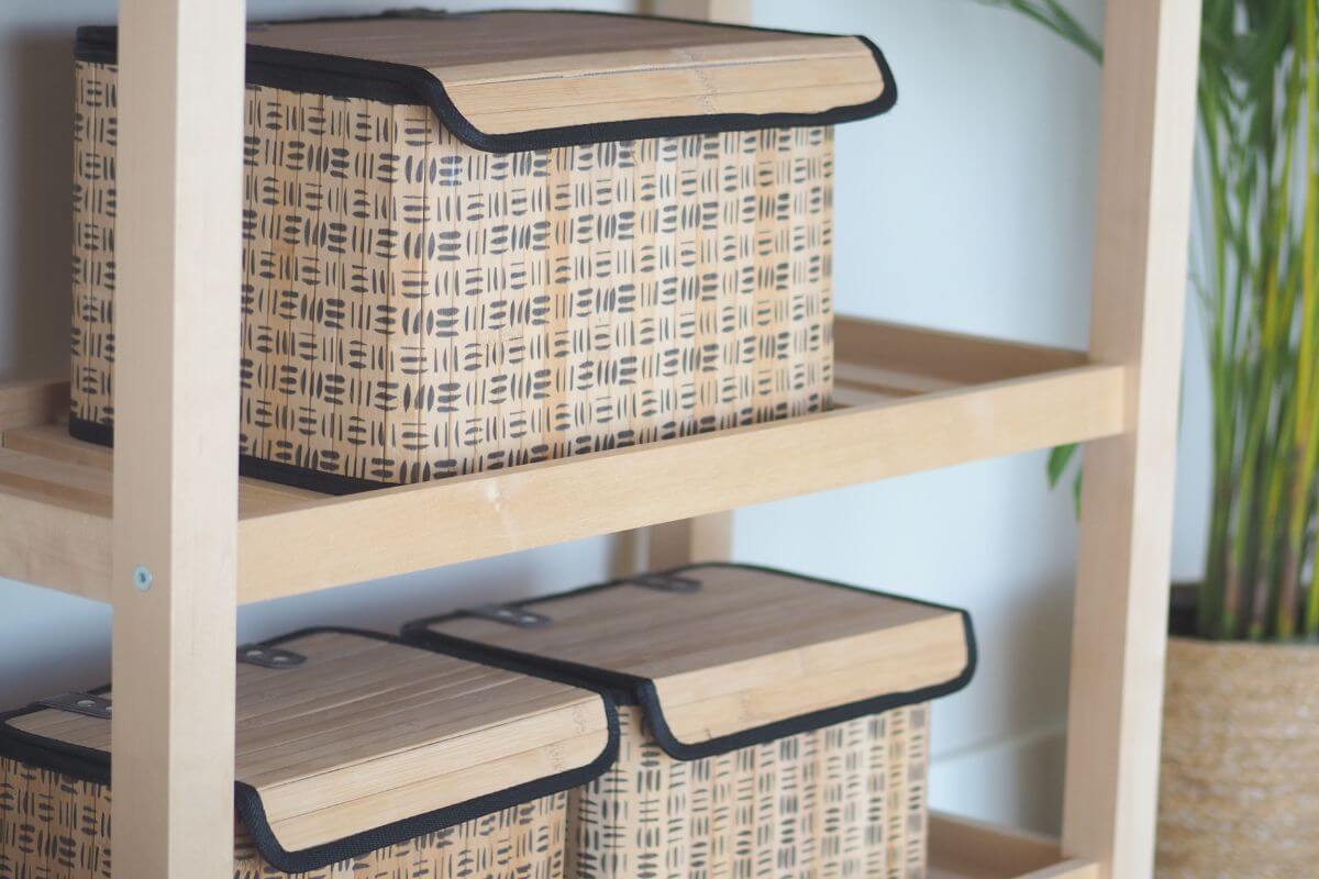 A picture of storage boxes on the shelf.