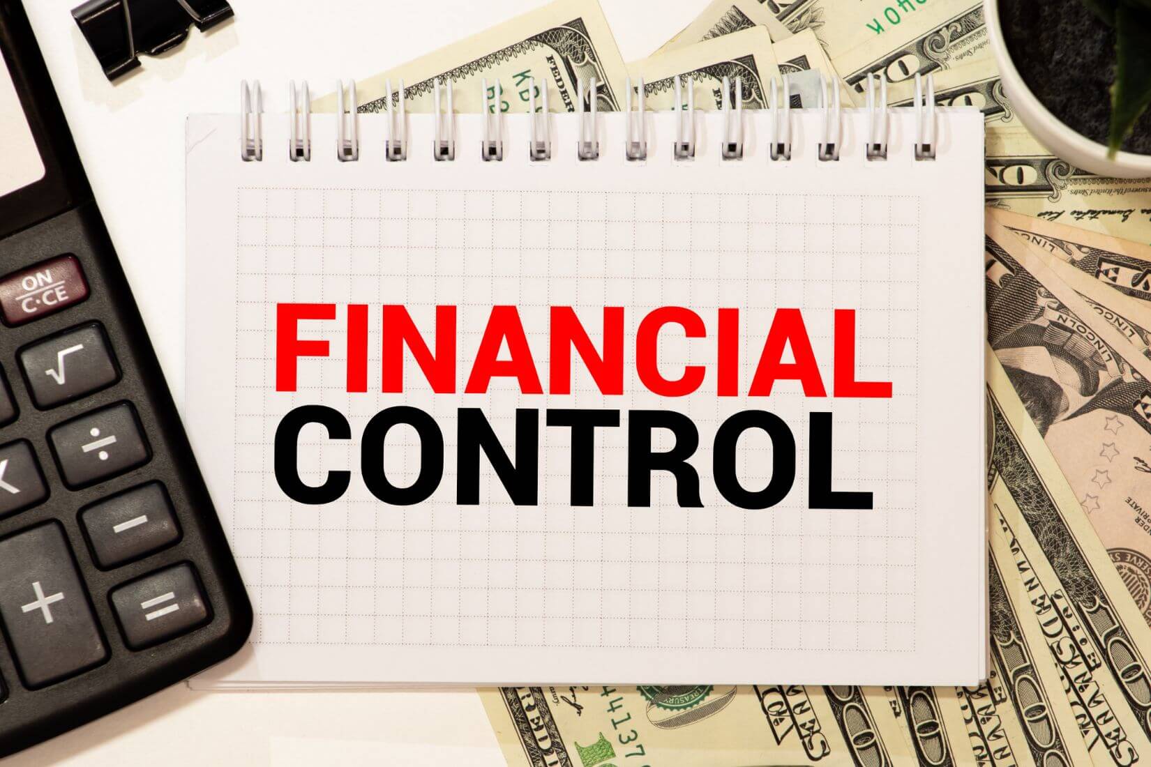 A picture shows a paper with financial control wording.