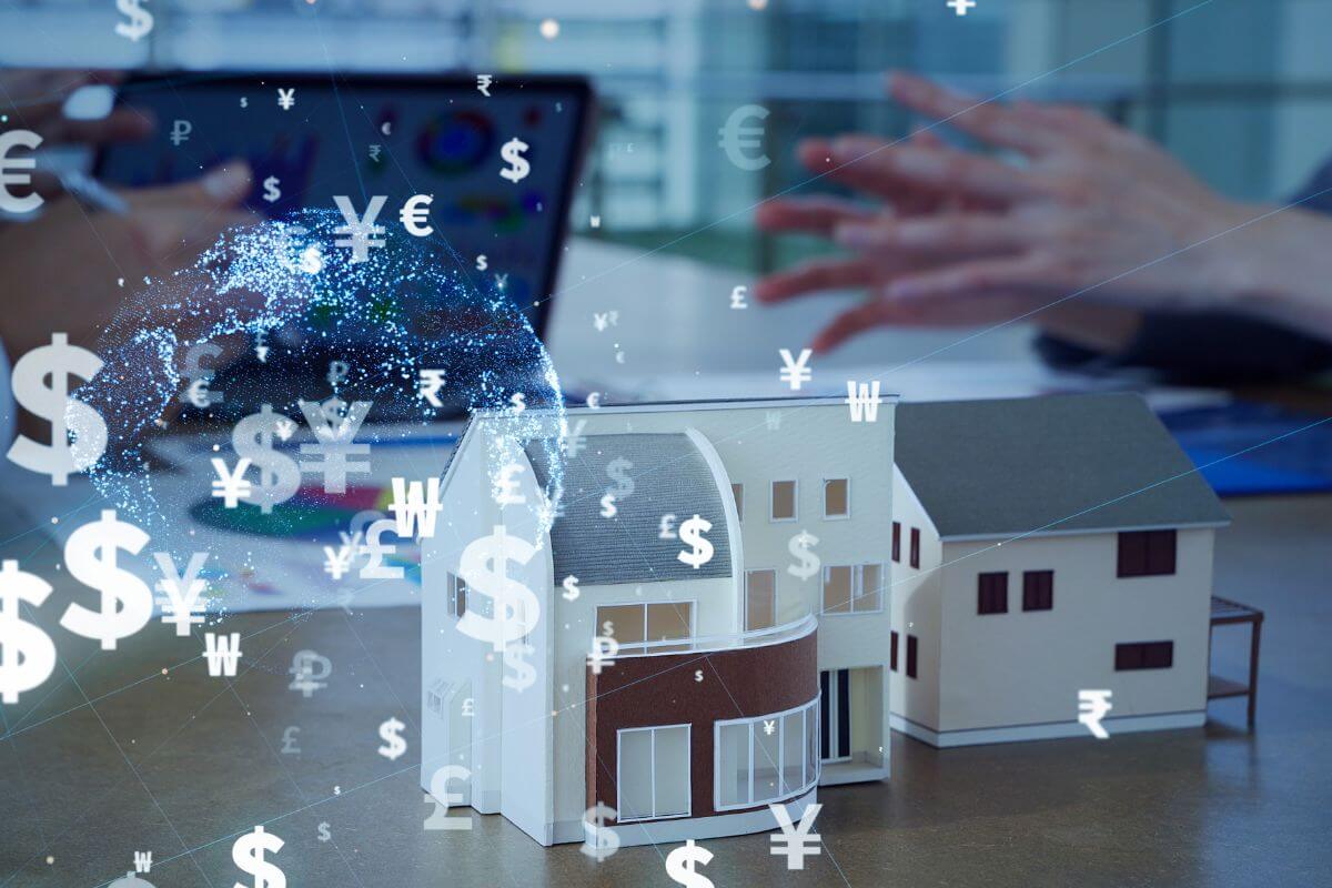 A picture of a mini house and currency symbols.