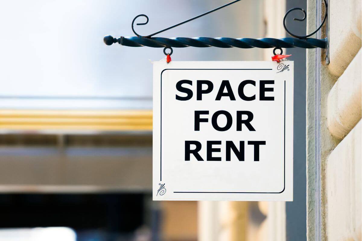 An image shows space for rent signage.