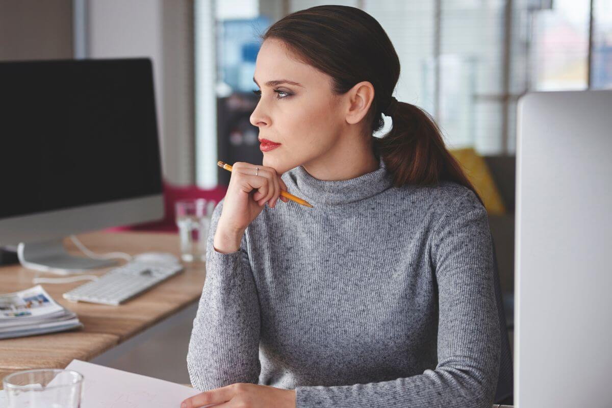 A picture shows a woman thinking deeply.