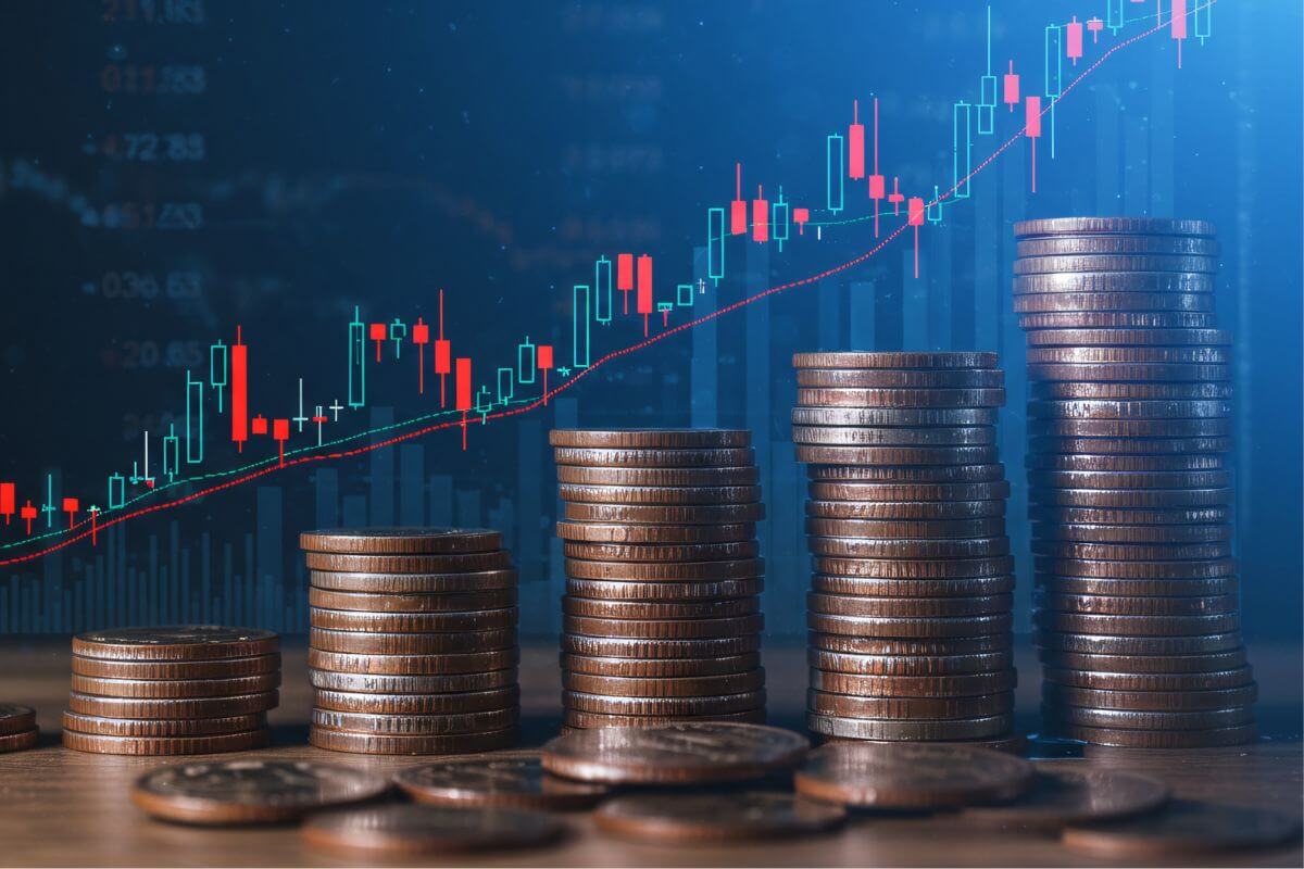 A picture shows stacks of money and a graph.