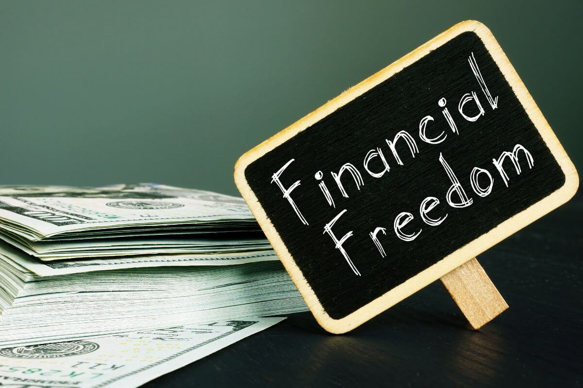 A picture shows money and financial freedom wording.