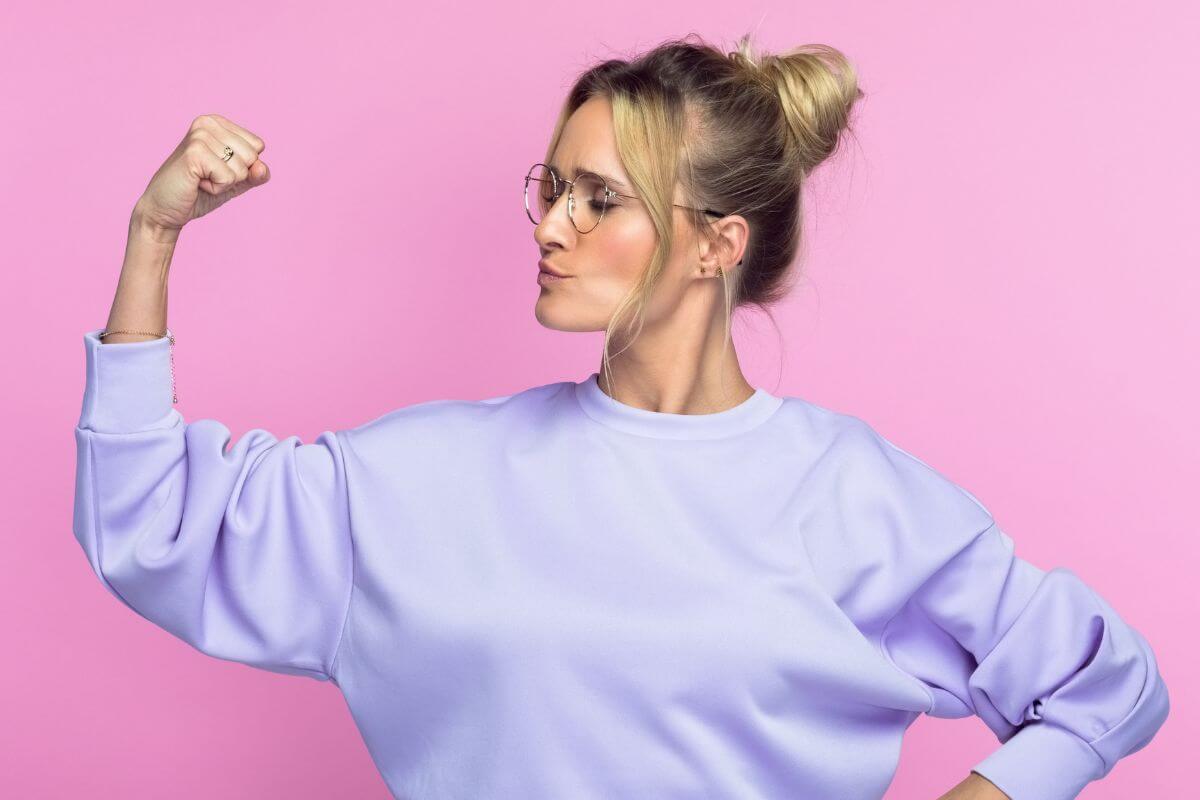 An image of a woman showing her confidence.