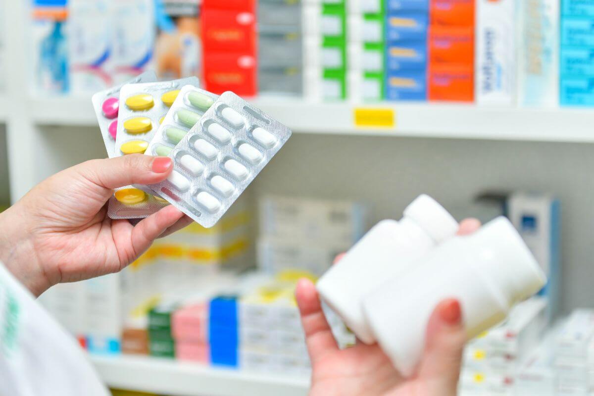 An image shows a woman buying medicines.