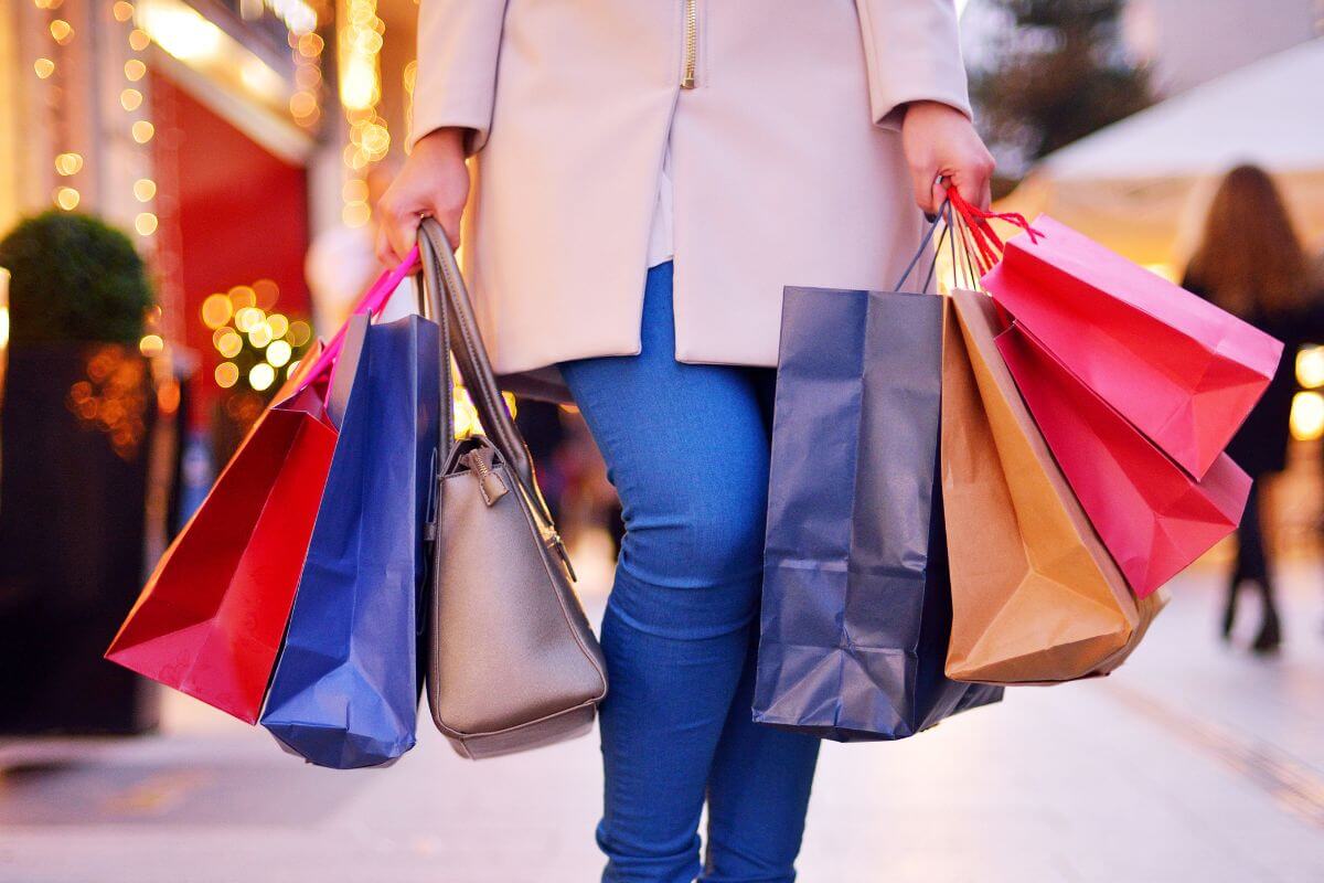 A picture shows a woman going shopping.