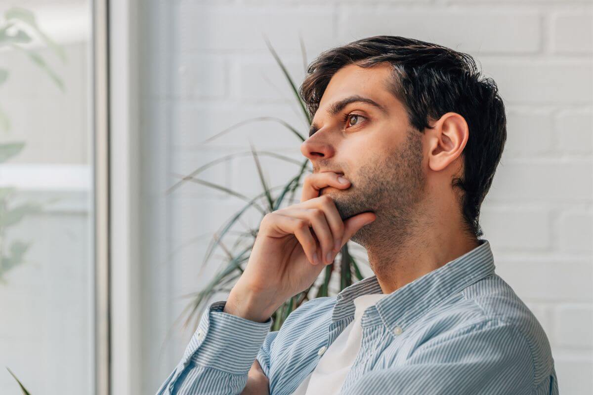 A picture of a man thinking deeply.