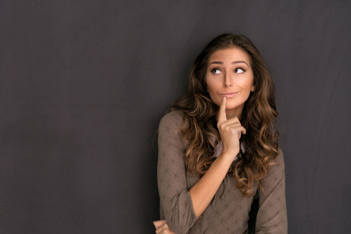 An image of a woman thinking about something.