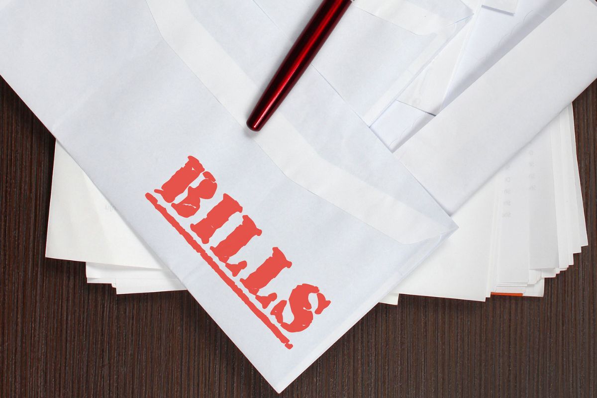 A picture of envelopes with bills wording.